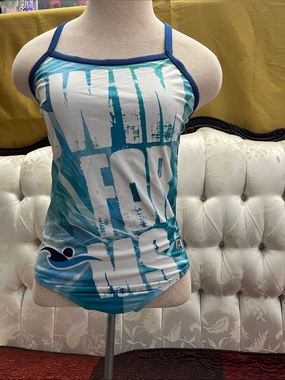 Hardcore Swim Lady's Teal Graphic One-Piece Swimsuit with Navy blue  Trim.
